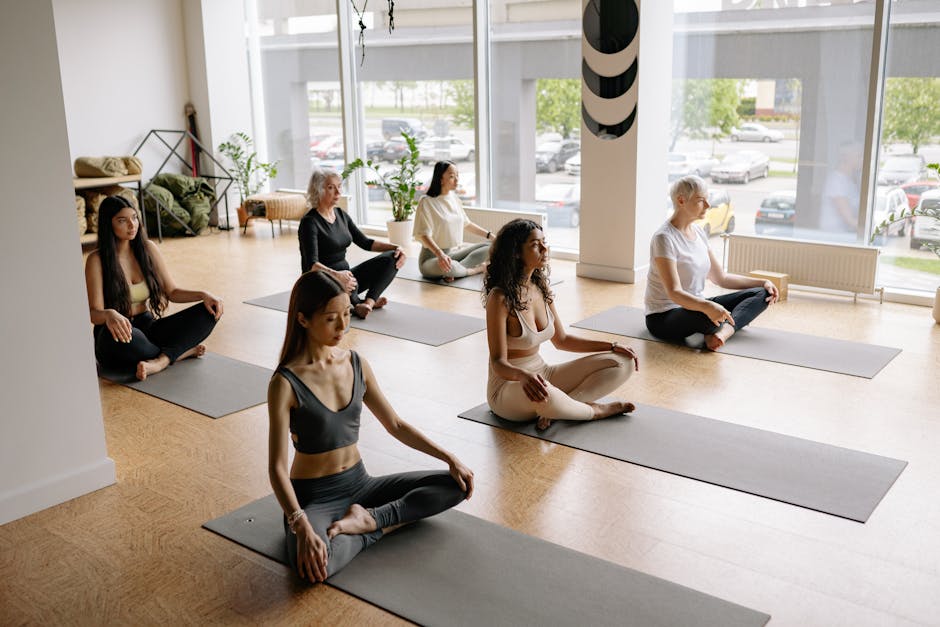 Diverse group of people practicing yoga